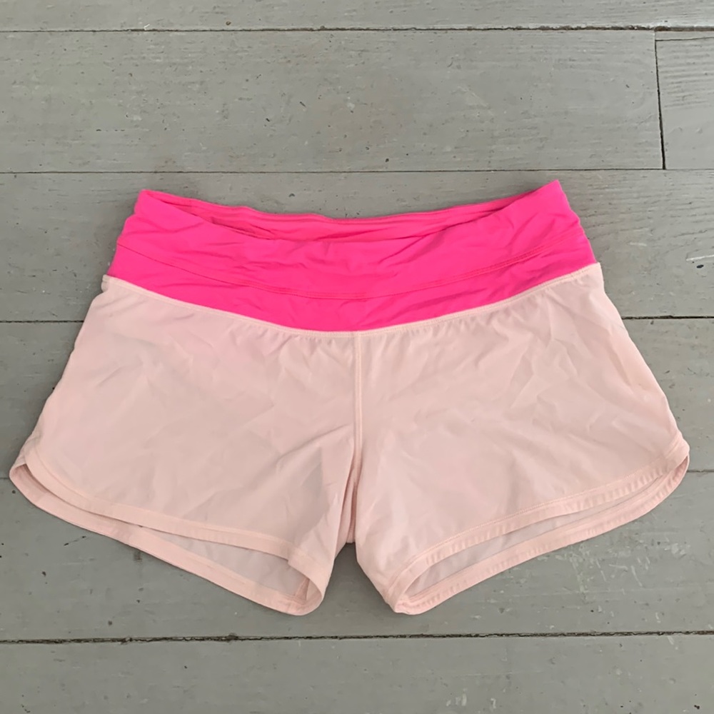 Pink lululemon running shorts
